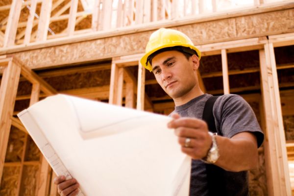 an engineer looking at the drawing