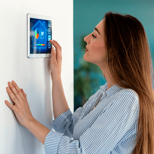 woman using HVAC system for home. Technology for eco-friendly home.